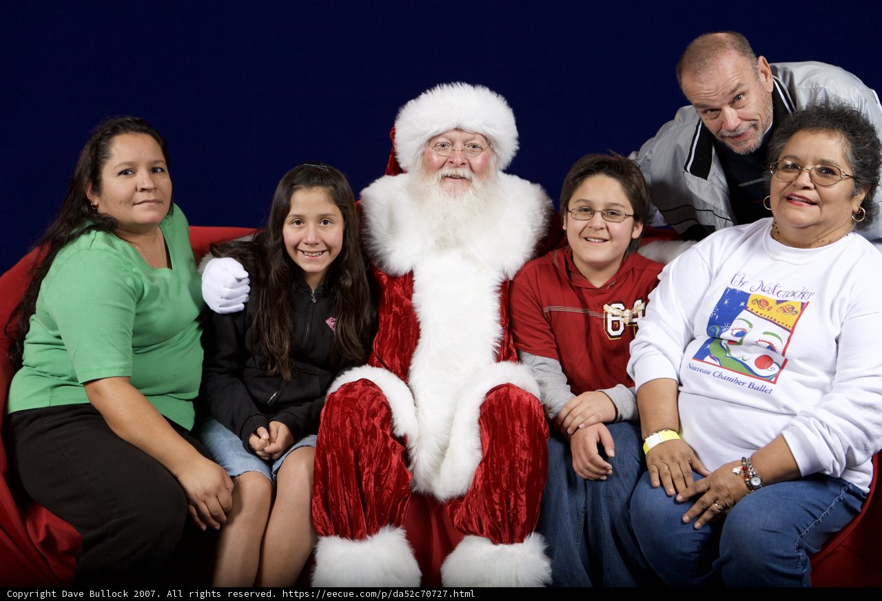 A Festive Family Portrait with Santa