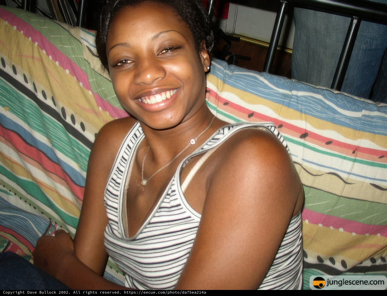 Joyful Moment on the Cozy Bed