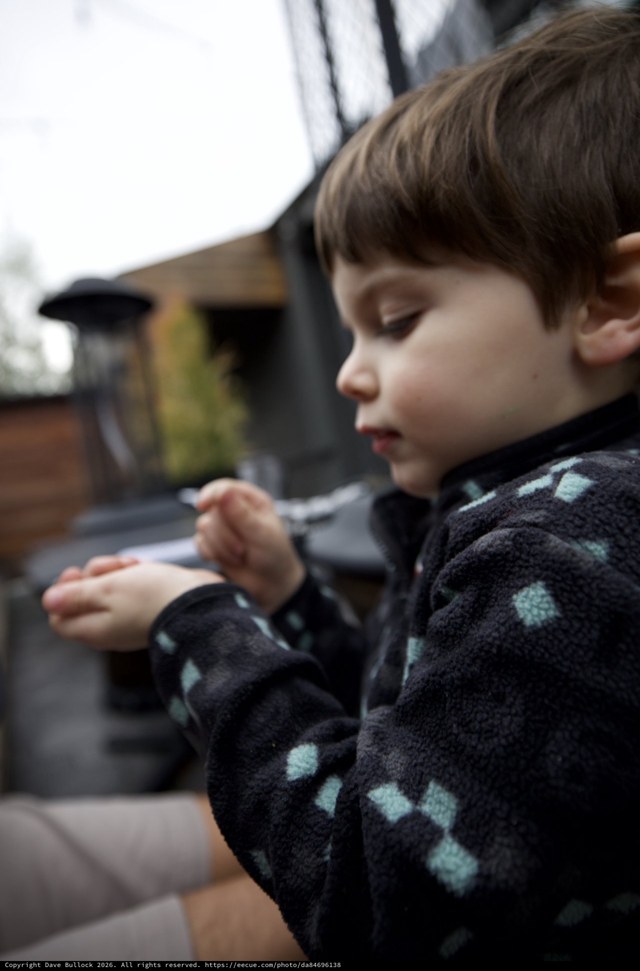 Young Child in Cozy Patterned Fleece at Home