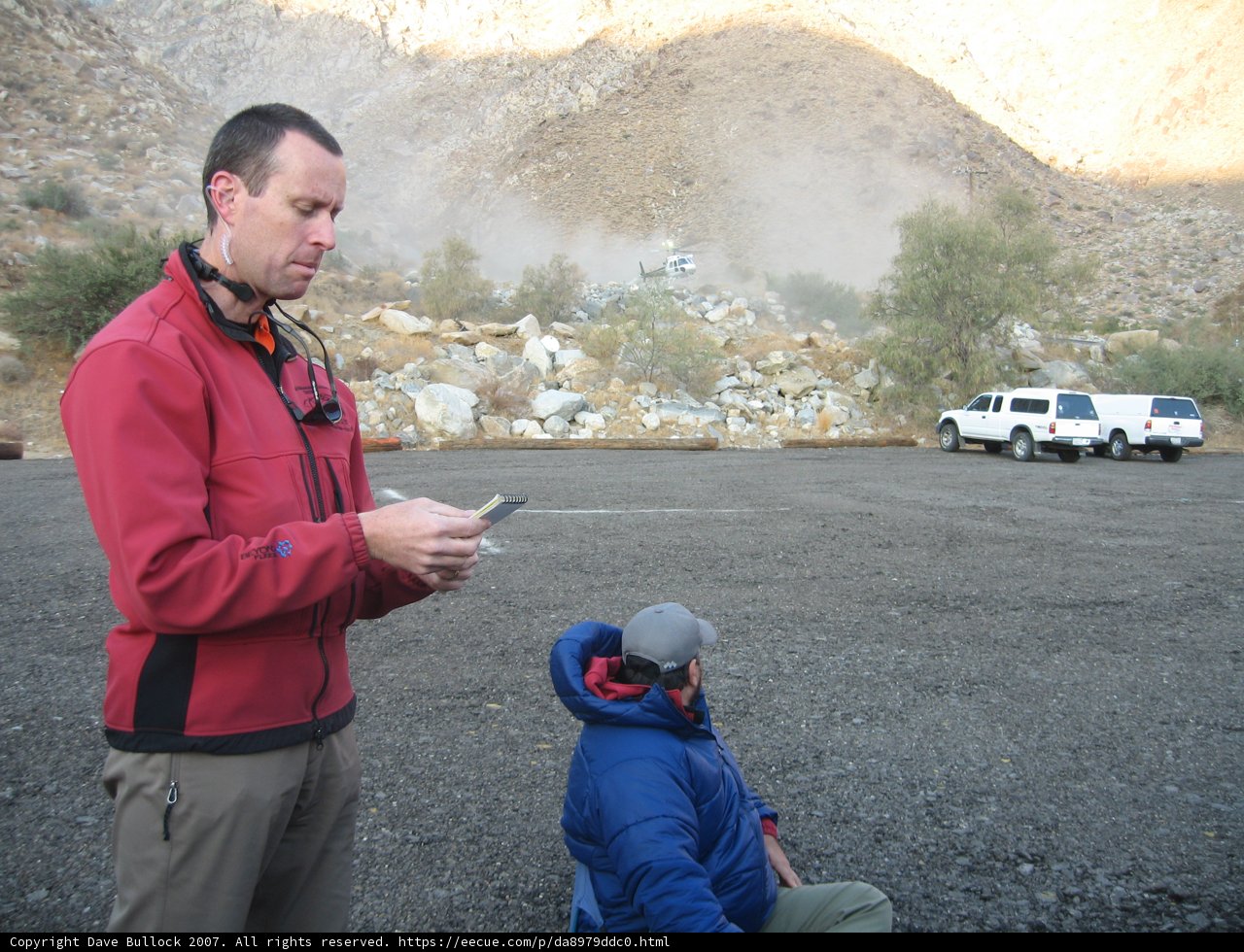 Red Jacketed Man on Gravel Road