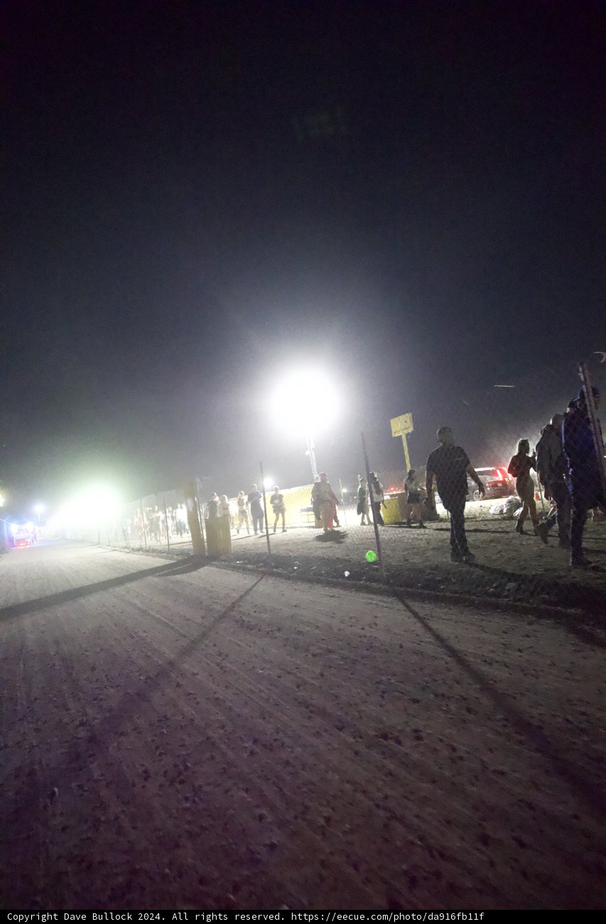 Illuminated Pathways: Coachella 2024 Night Scene