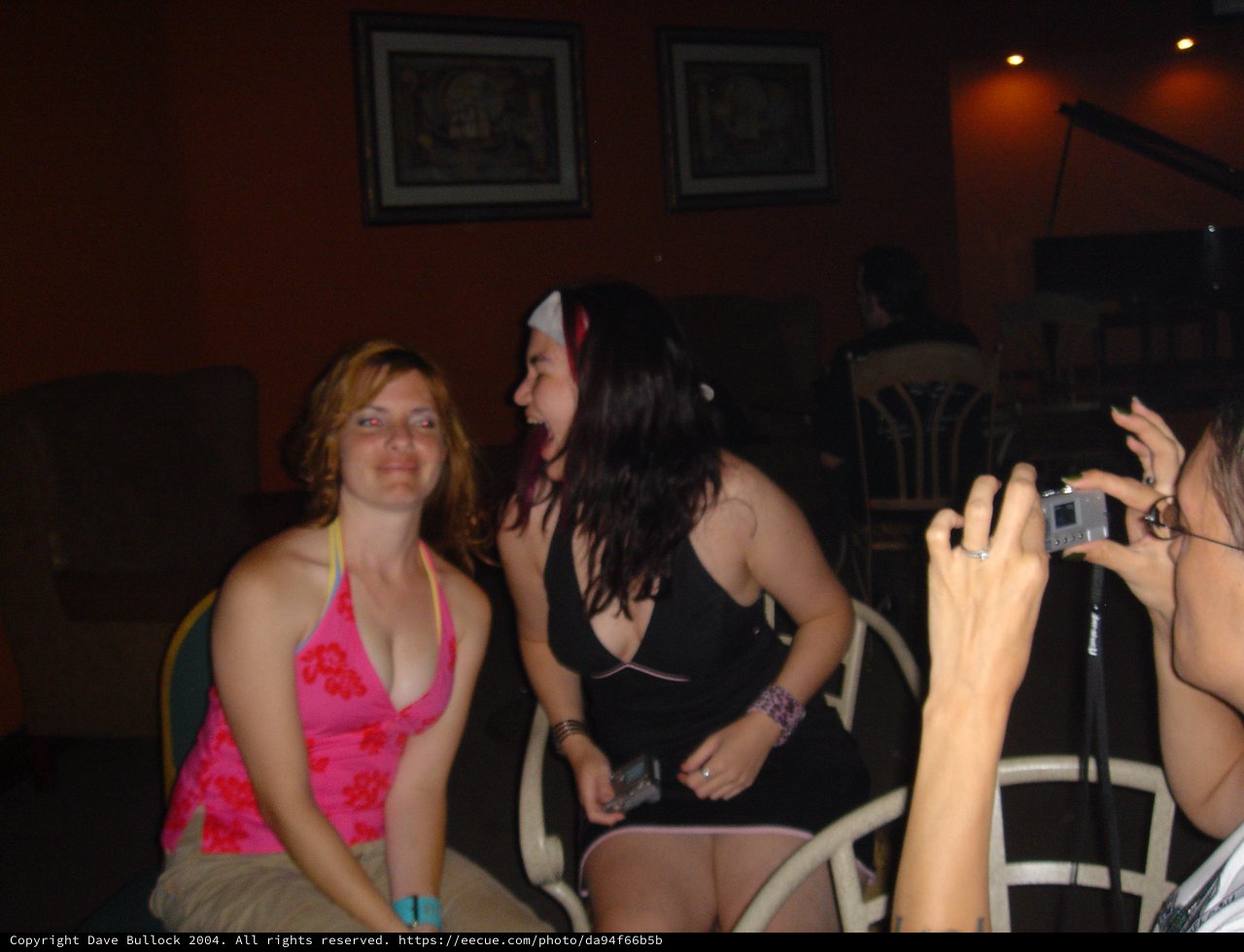 Friends Laughing Together at Late Night Party