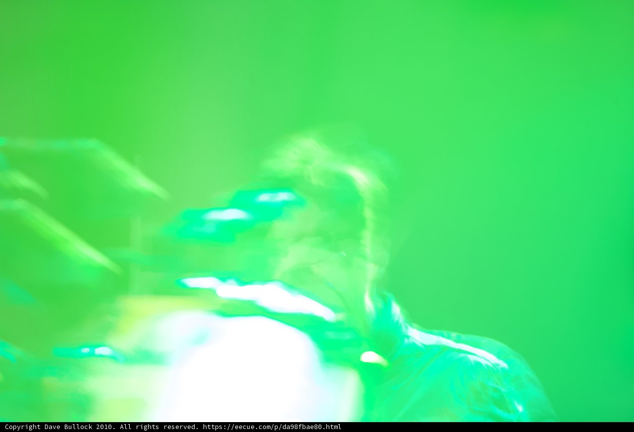 Blurry Night Time Guitar Player