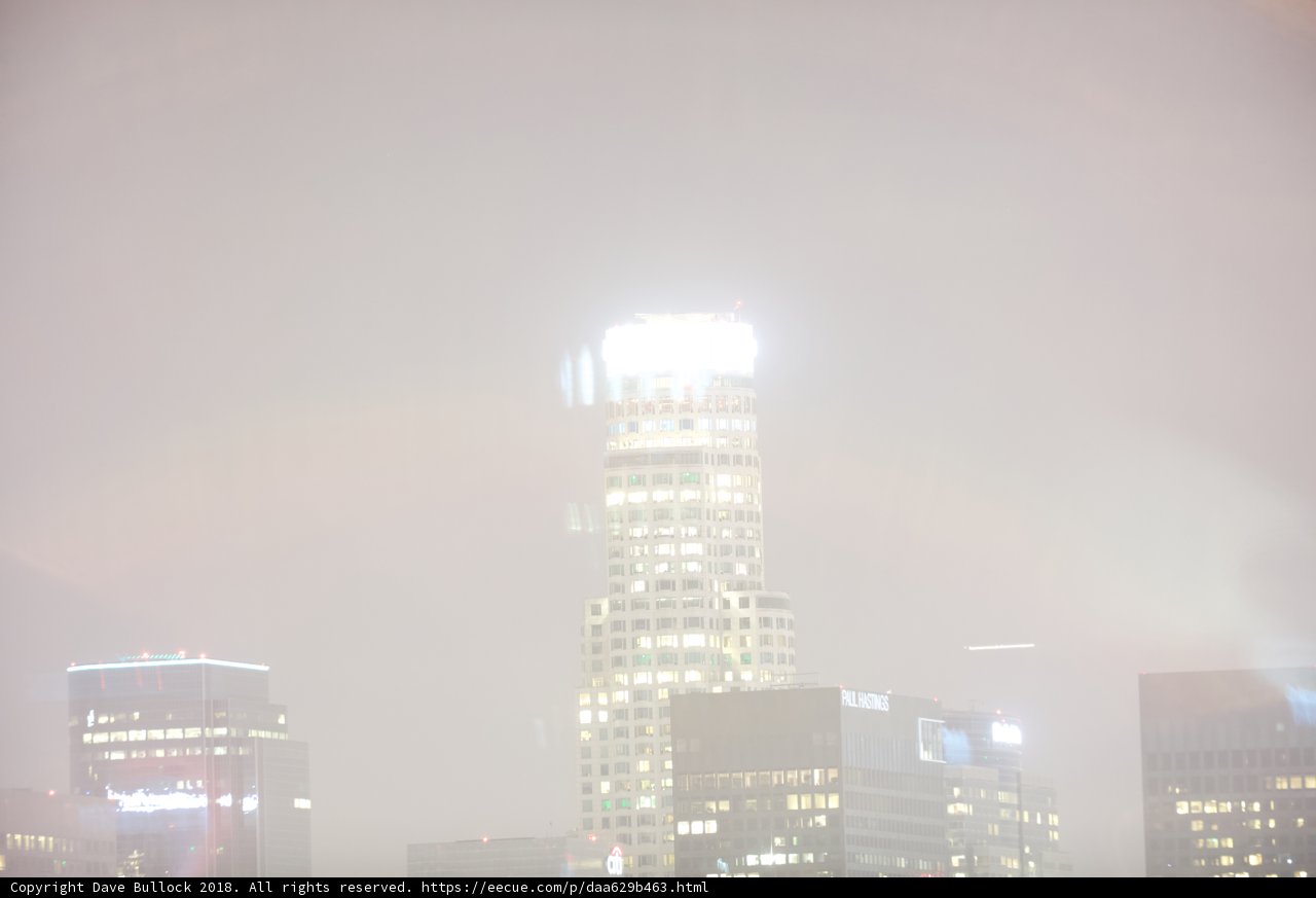 Shrouded in Mist: A Foggy Night in the City
