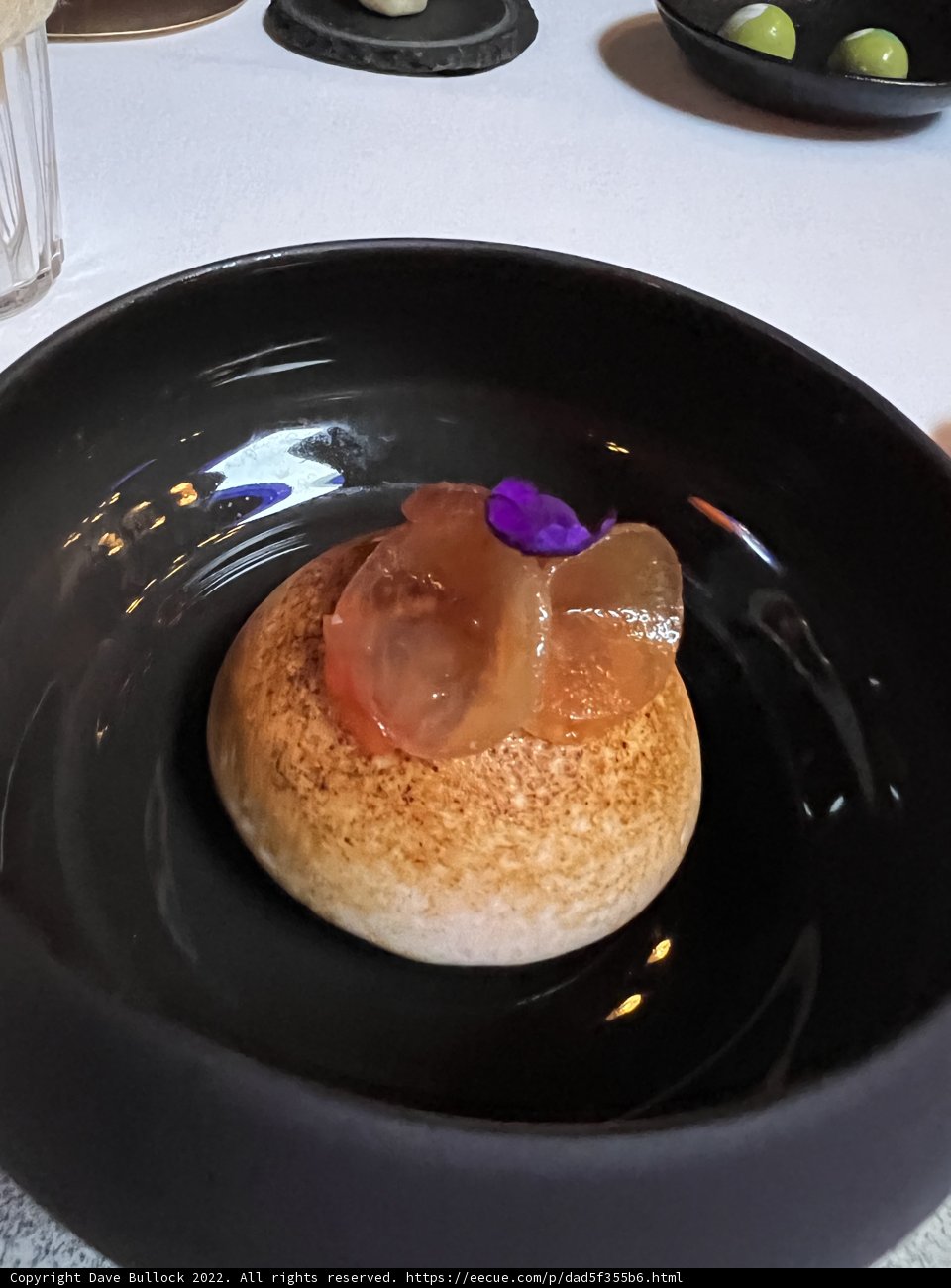 Decadent Flan in a Black Bowl