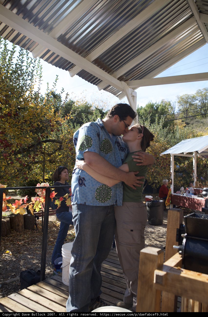 Hugging under the Porch Pergola