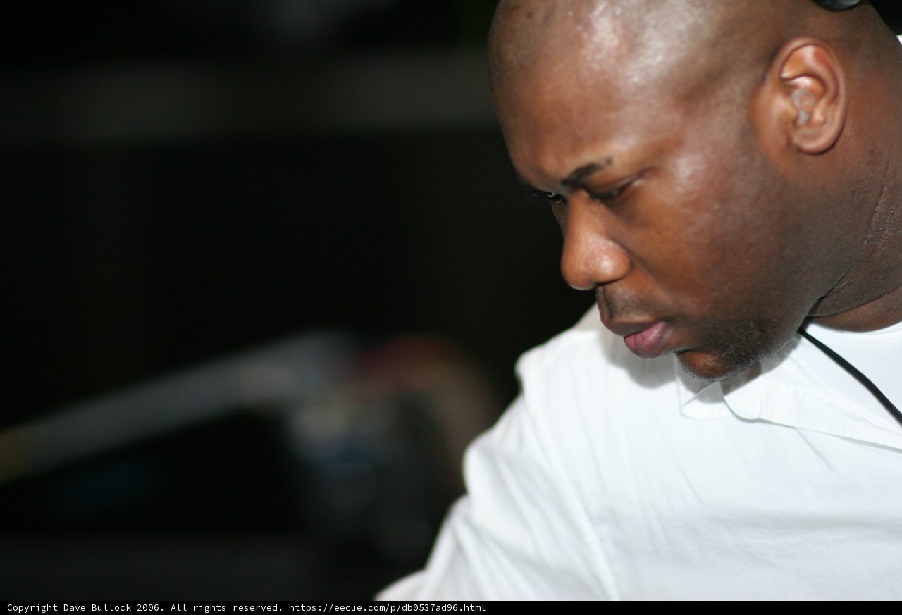 White Shirt, Microphone in Hand