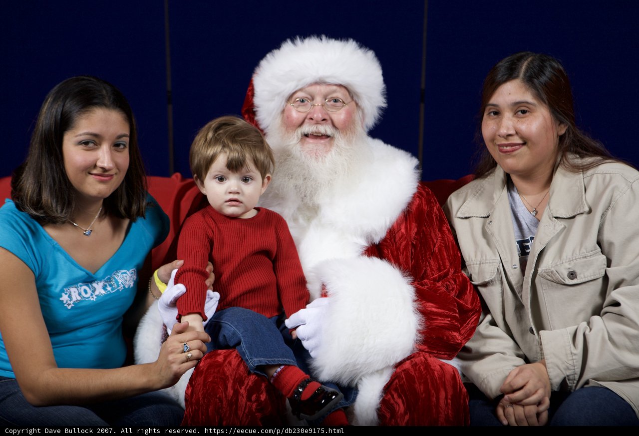 Jolly Santa and Two Little Helpers