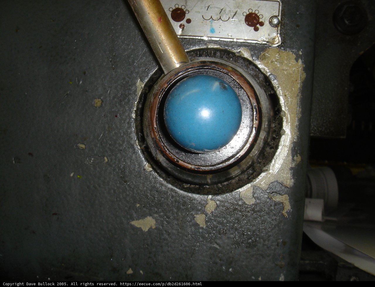 Blue Sphere on Metal Object