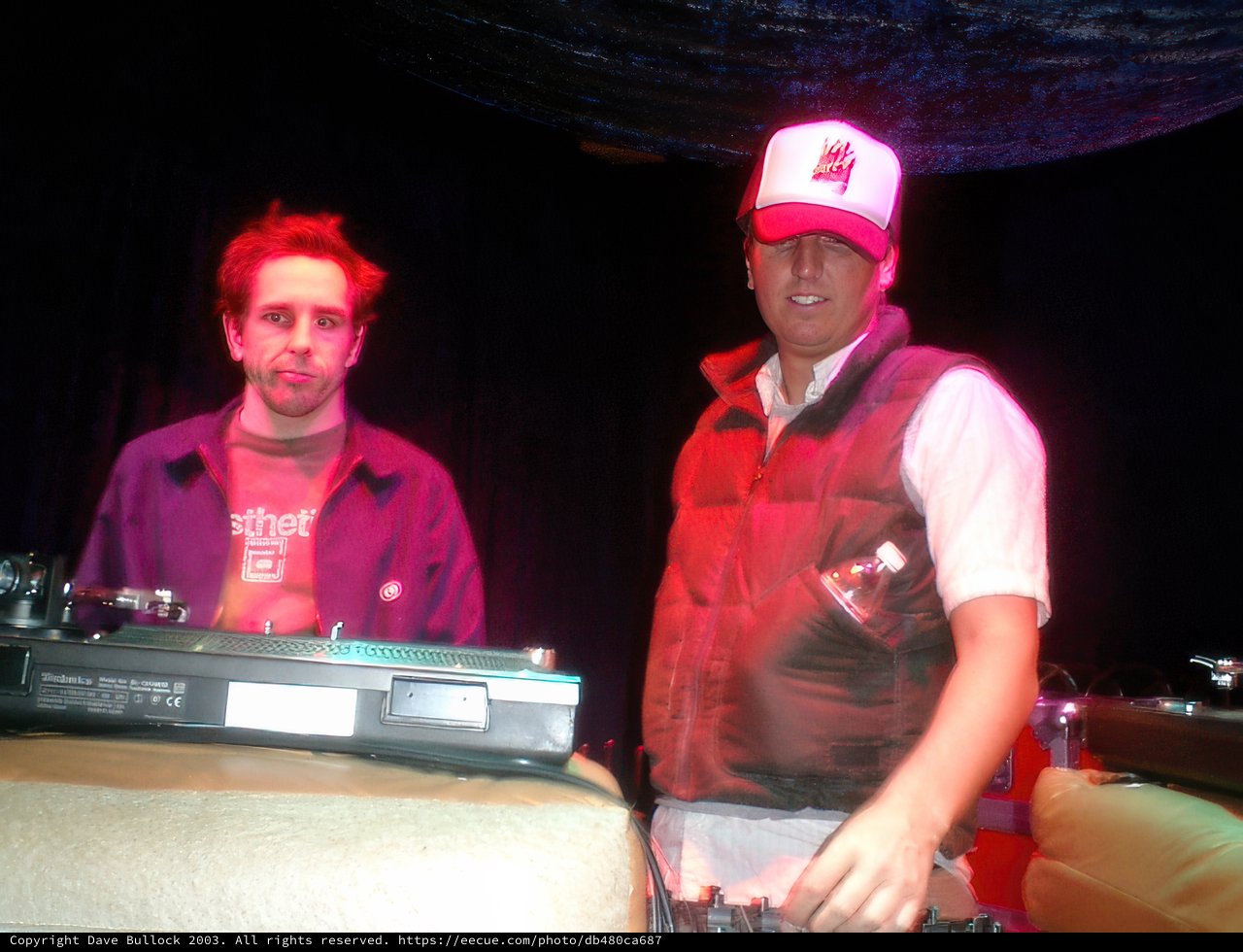 DJ Jake Busey rocks the club in his signature white vest