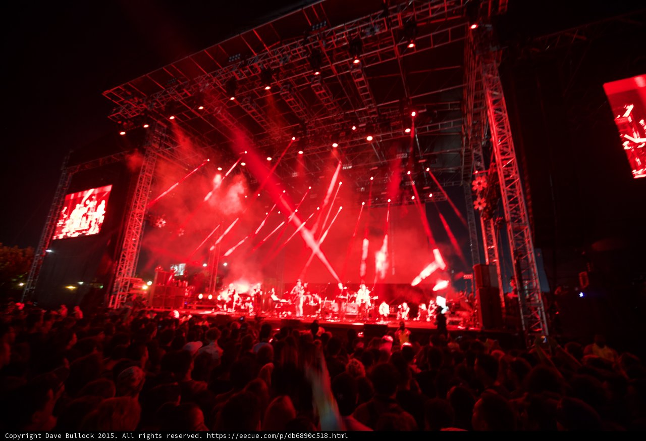 FYF Fest Wide Stage Red Lighting Ensemble Video Screens Both Sides Spotlight Beams Trees