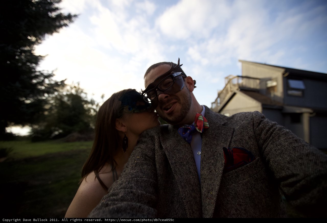 Masked Couple Shares a Tender Moment at Wedding