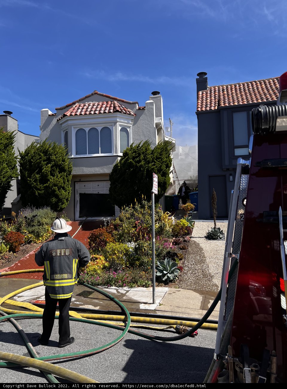 Fireman and Hydrant in the Suburbs