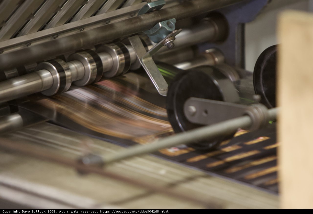 The Paper-Making Machine on the Conveyor Belt