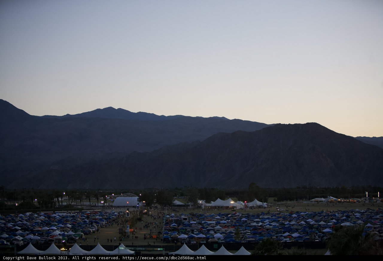 Majestic Mountains and Camping Tents at Dusk
