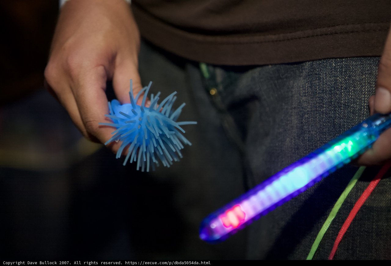 Nocturnal Playtime with Glowing Stick and Toy