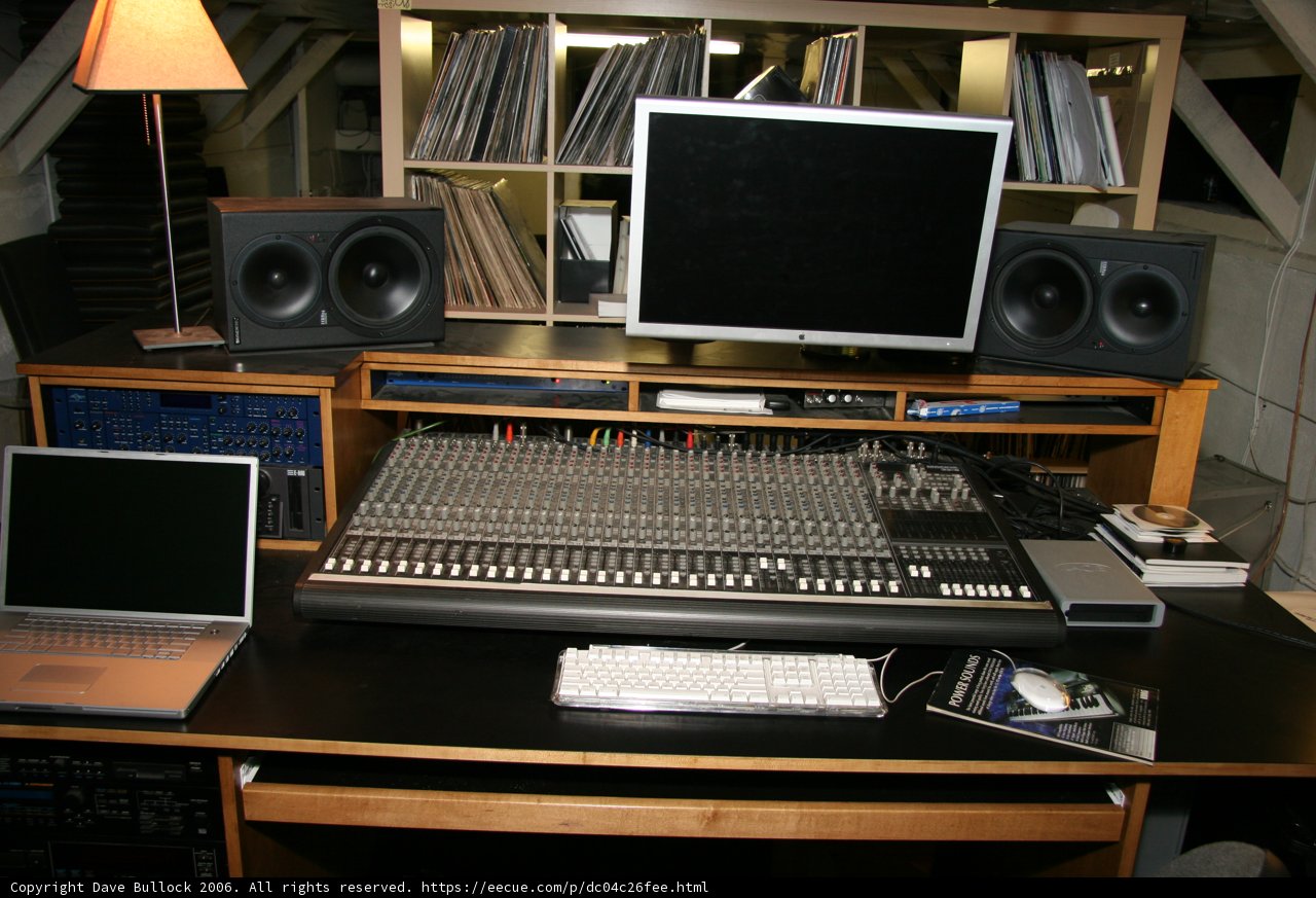 Black Desk with Computer and Speakers