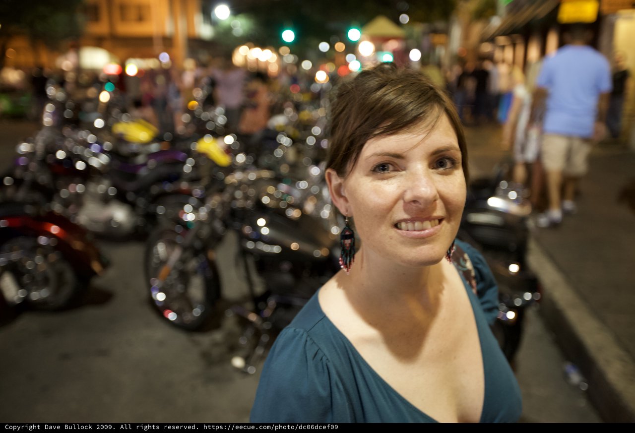 Woman Smiling at Night Motorcycle Rally Street