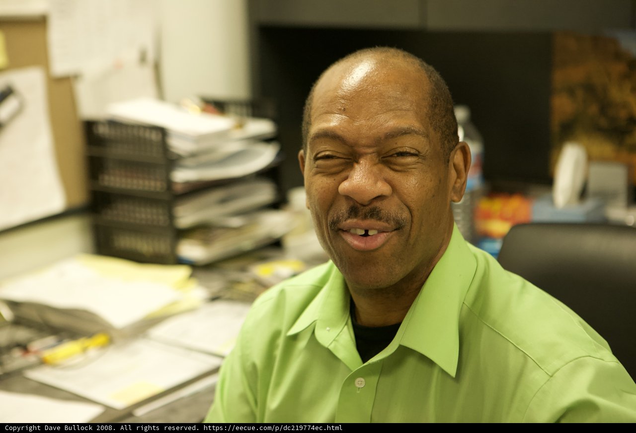 Green-Shirted Man in The Office