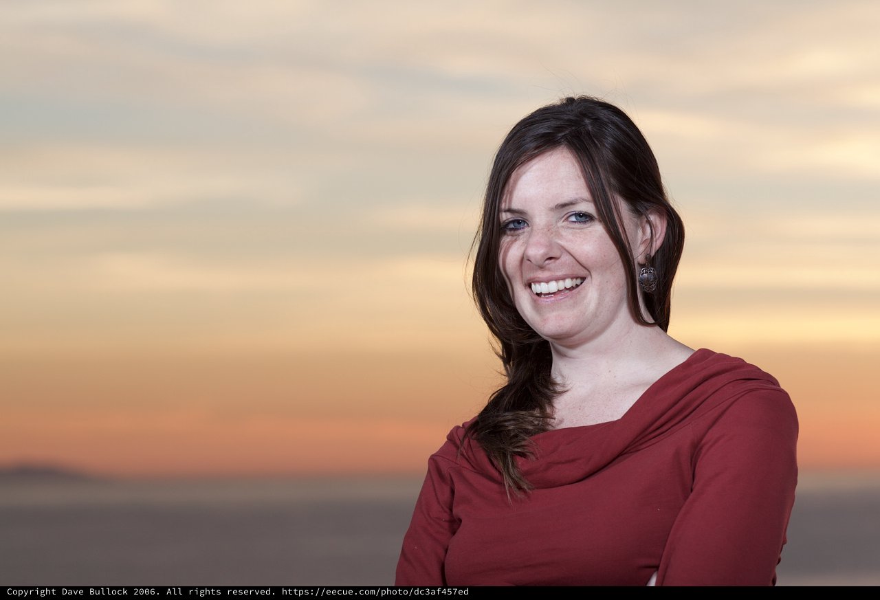 Smiling Woman at Golden Hour Sunset
