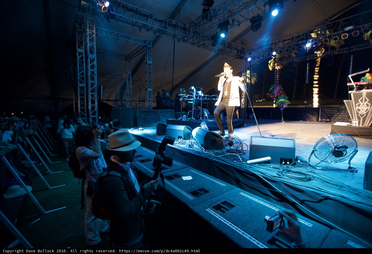 Man on Stage with Microphone at 2010 Cochella Friday Concert