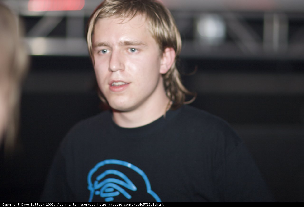 Blonde-haired Teen Smiling in Funky T-Shirt