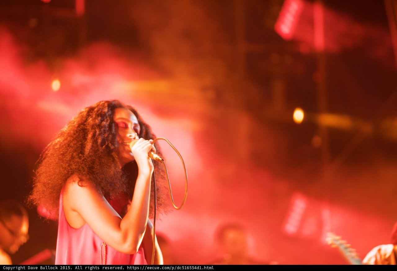 Solange Portrait Eyes Closed Guitarist Red Orange Haze