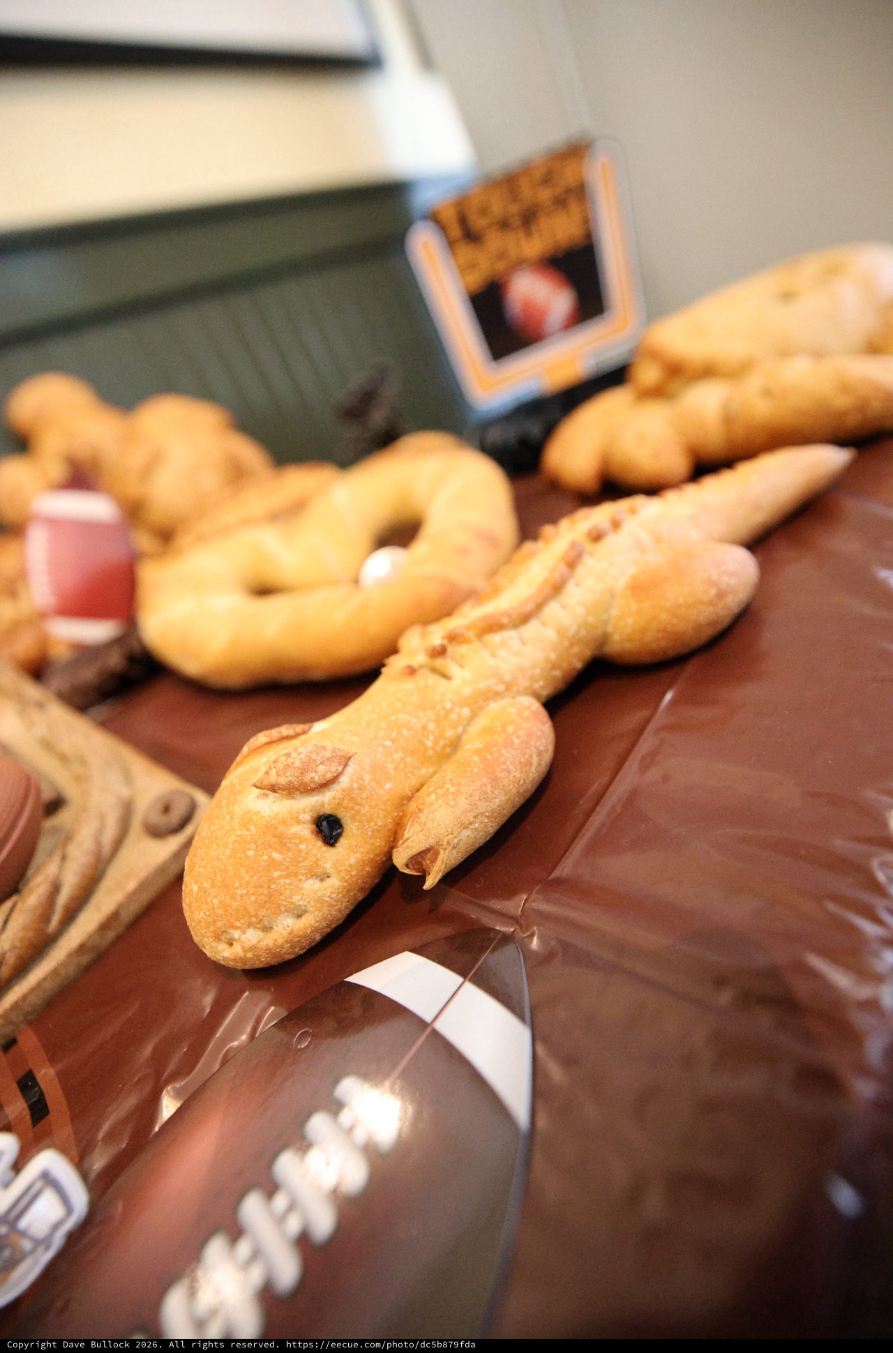 Artisan Baseball-Themed Bread Display on Wooden Table