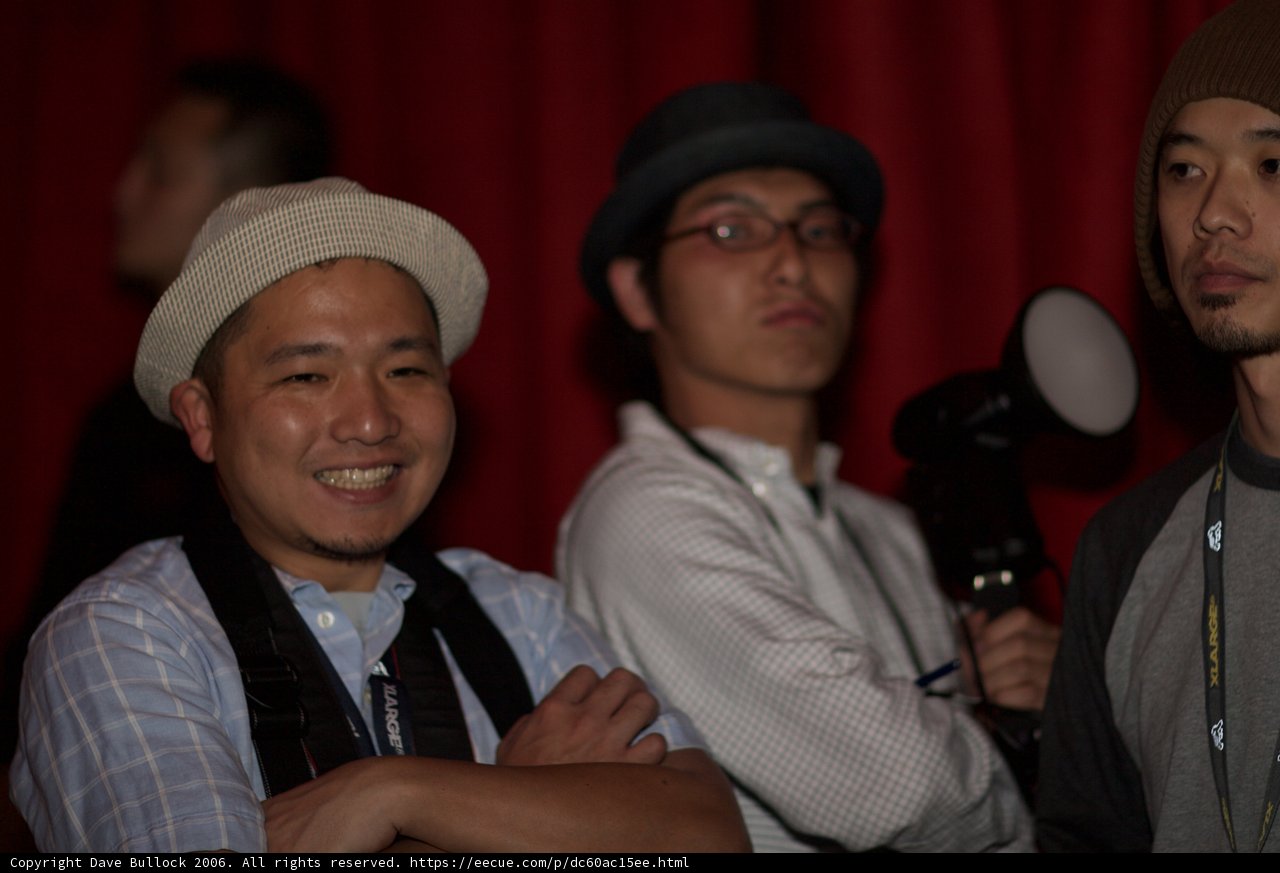 Three Men Strike a Pose for the Camera
