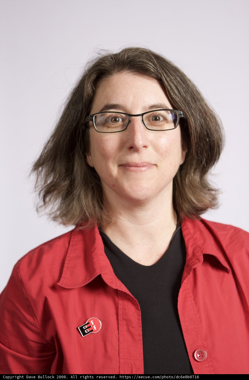 Cindy Cohn in red shirt and glasses