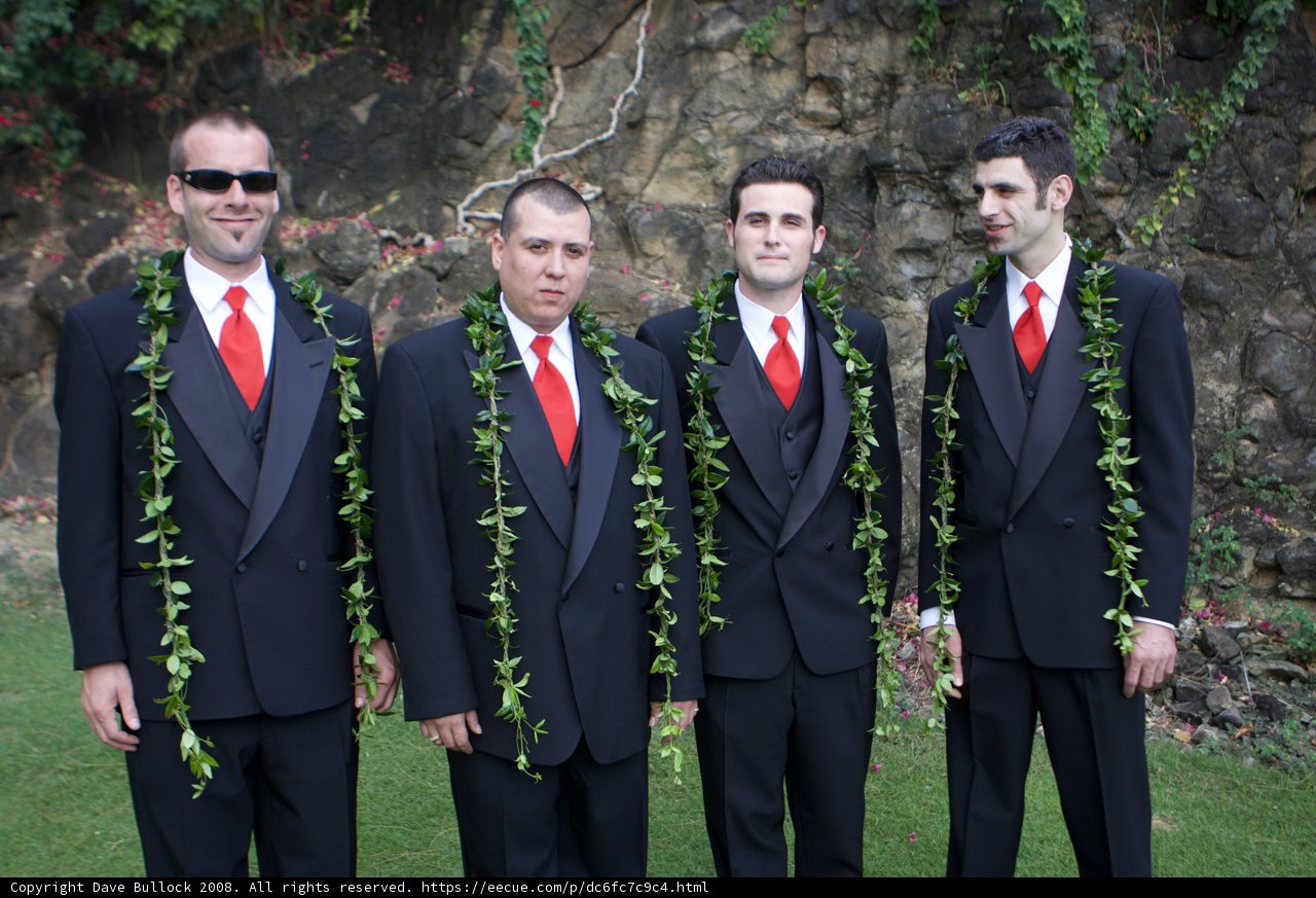 Four Suave Men in Suits and Ties