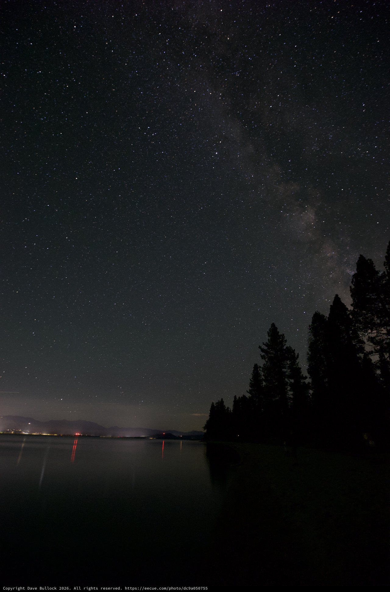 Milky Way Arches Over Tranquil Lake Tahoe Shoreline