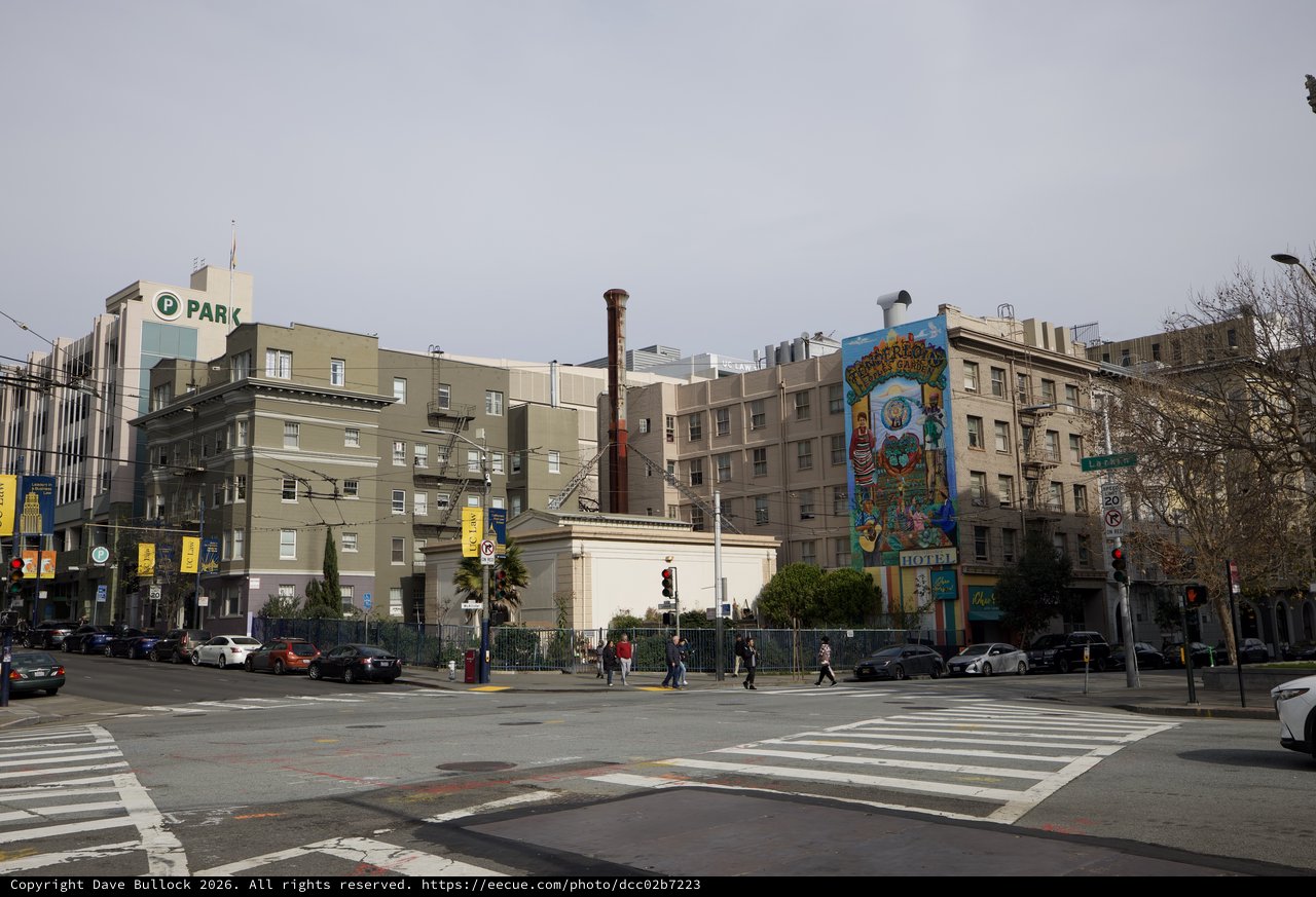 Urban Street Corner with Colorful Mural in Overcast San Francisco