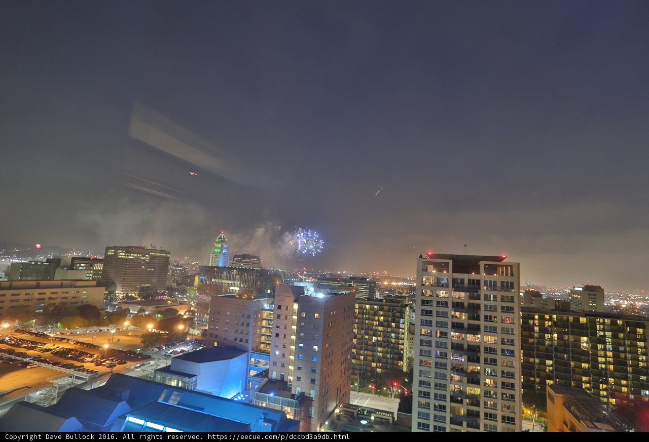 Nighttime Fireworks Over Metropolis