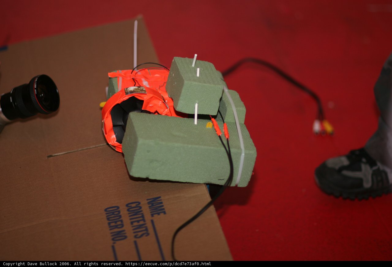Boy Holding Mysterious Box with Wires