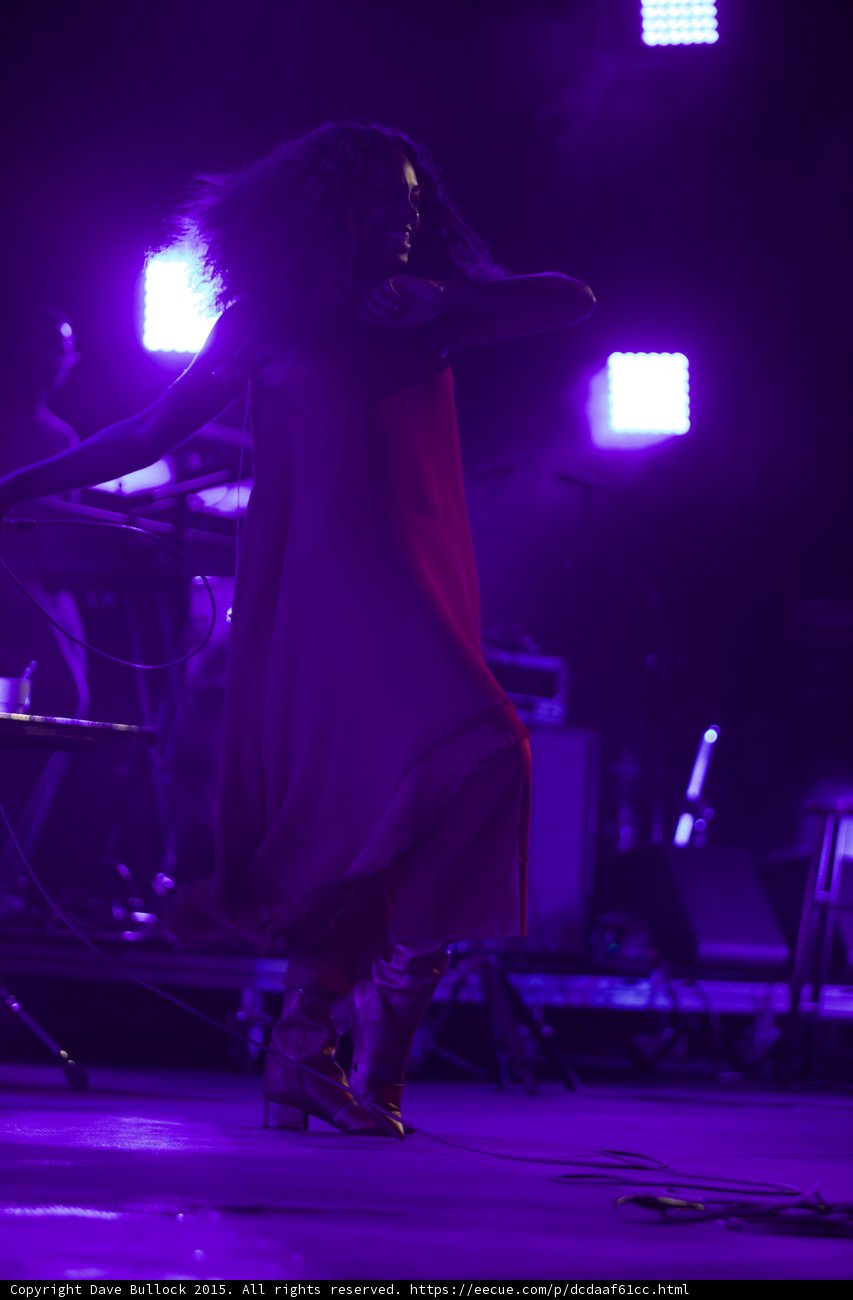 Solange Hands Near Face Red Dress Purple Haze Stage
