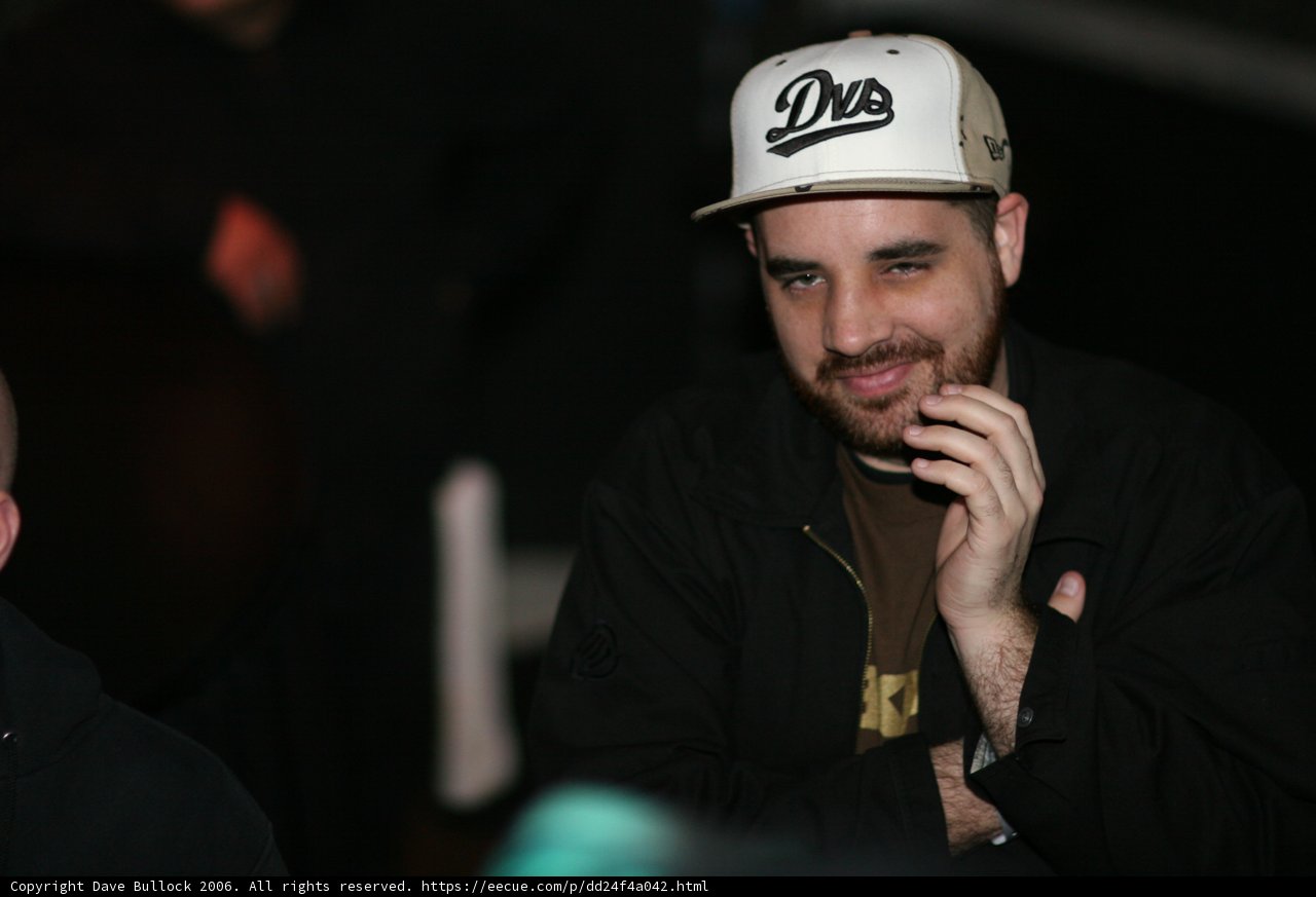 Smiling Man in a Baseball Hat