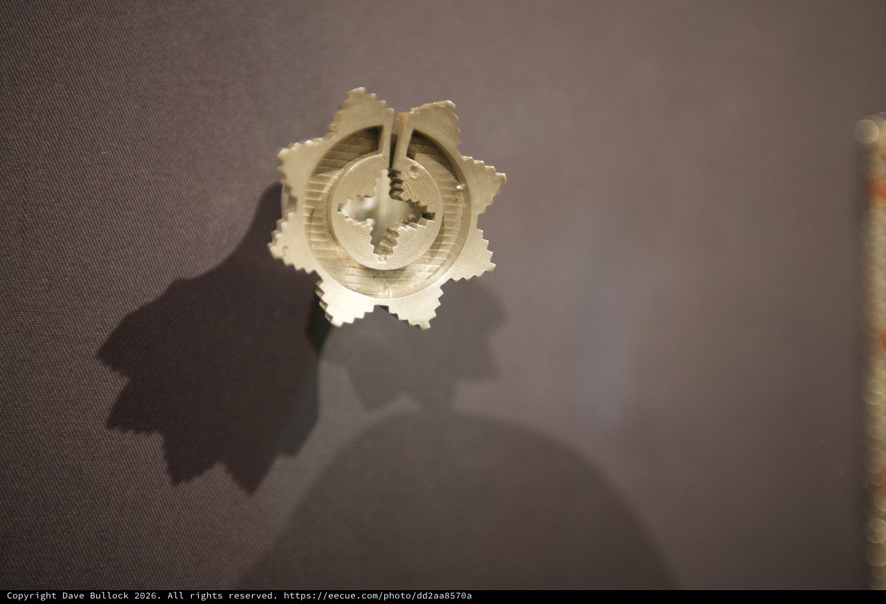 Intricate Wooden Sculpture with Concentric Circular Design