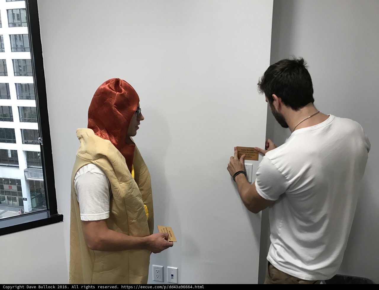 Two Men in Costume with Eye-catching Accessories