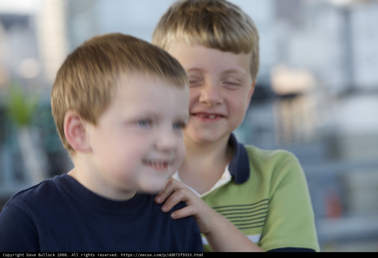 Happy Boys with their Fingers Intertwined