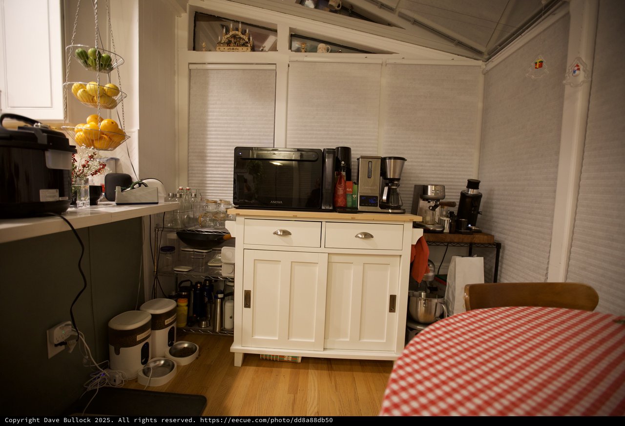 Cozy Kitchen Corner with Vintage White Cabinet