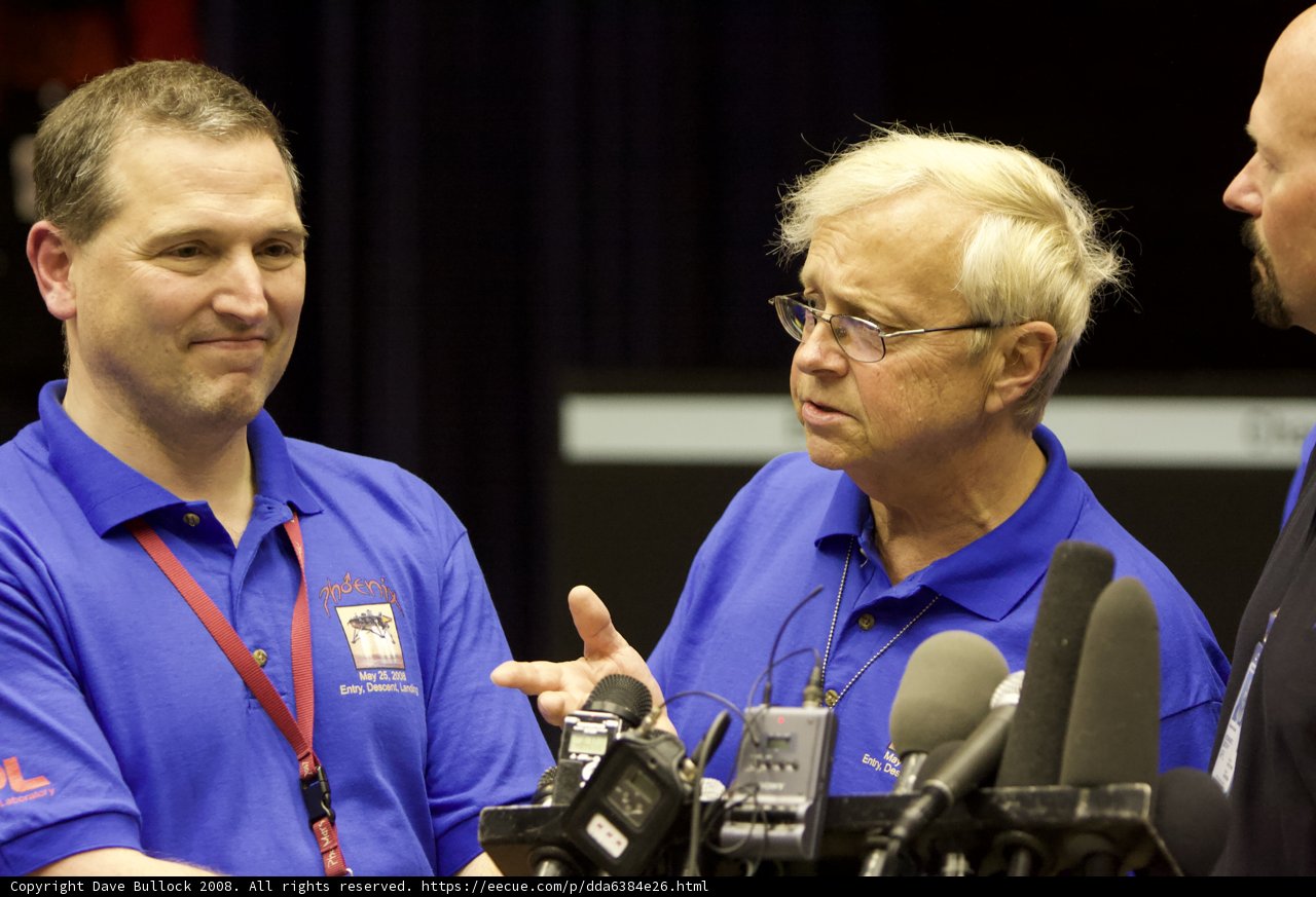 Press Conference with Three Blue-Shirted Men