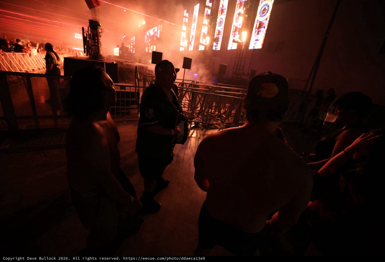 Silhouettes Dance Beneath Laser-Lit Wobbleland Stage