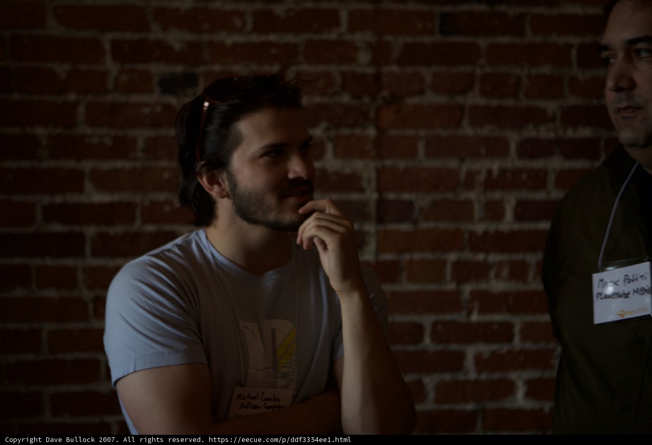 Two Men With Mic and Brick