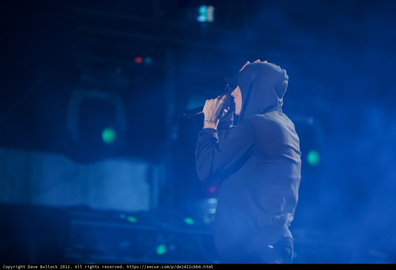Hooded Man Rocks the Stage