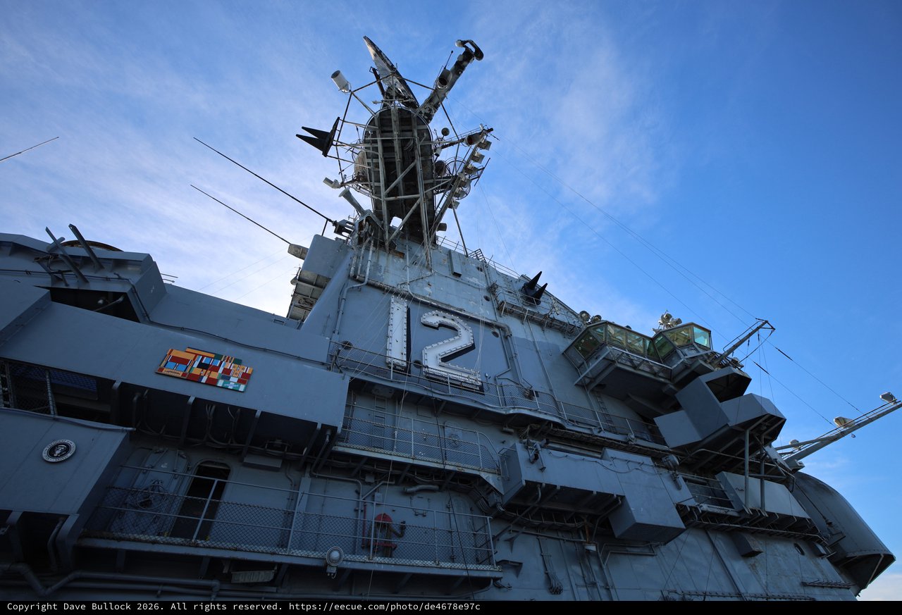 USS Hornet Island Superstructure Rising Against Blue Sky