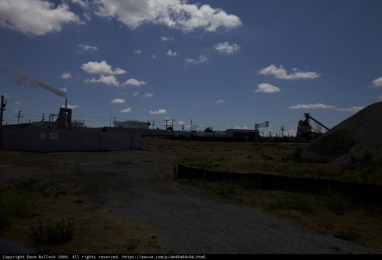 Factory Under a Cloudy Sky