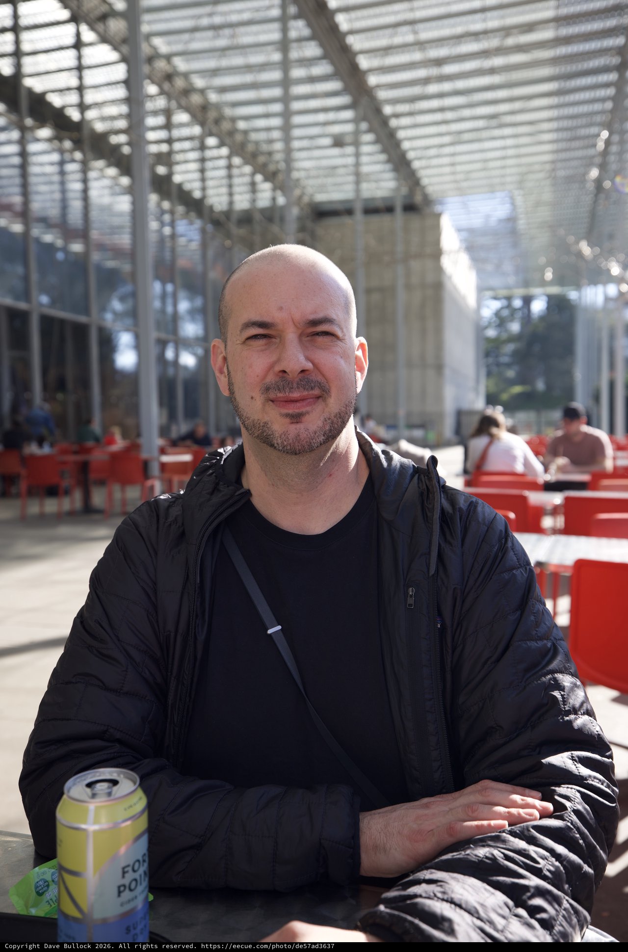 Portrait at Modern Public Space with Red Seating
