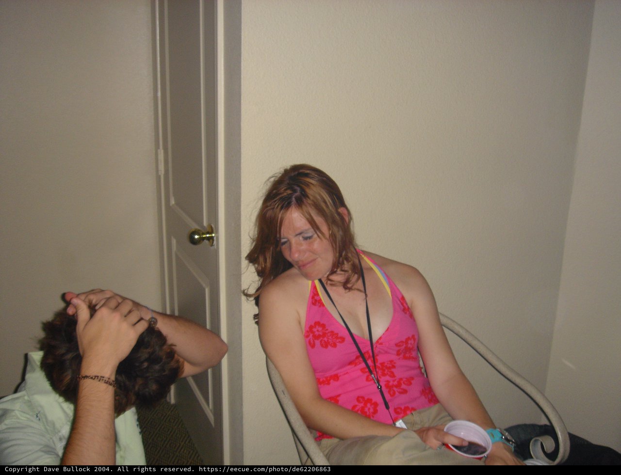 Young Woman Relaxing at Indoor Gathering 2004