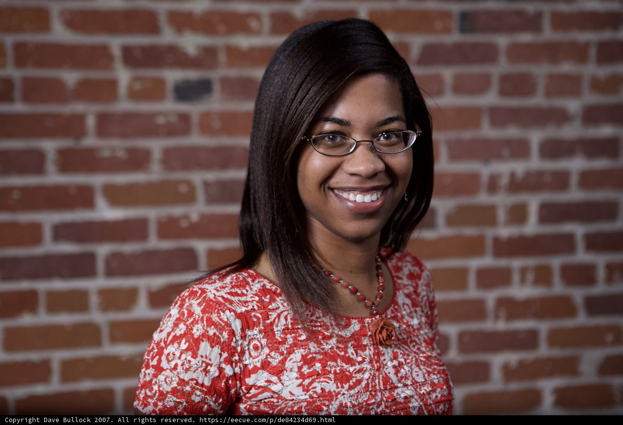 Woman with Glasses and a Red Shirt